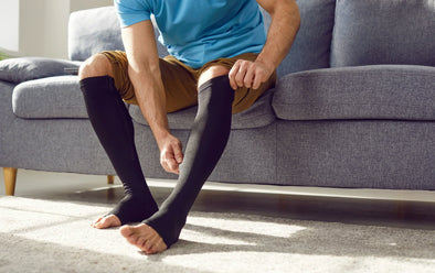 A man wearing compression socks.