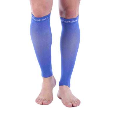 A man wearing Calf Compression Sleeve 30-40 mmHg BLUE by Doc Miller.