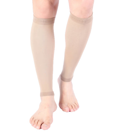 A woman wearing tan compression sleeve