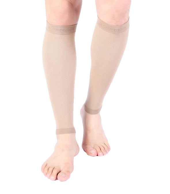 A woman wearing tan compression sleeve